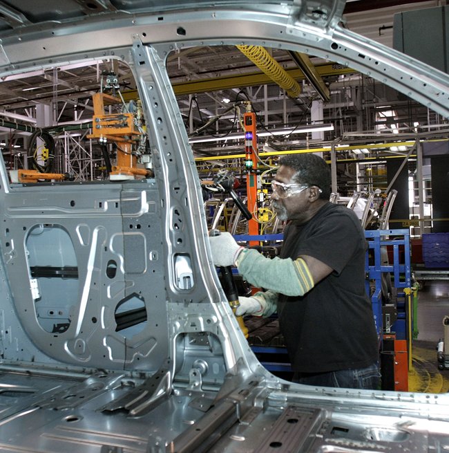 Сборка автомобилей на заводе “General Motors”