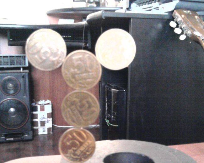 Фокус с монетами (6 фото)