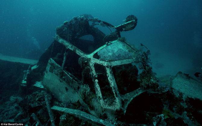 Подводное кладбище кораблей (21 фото)