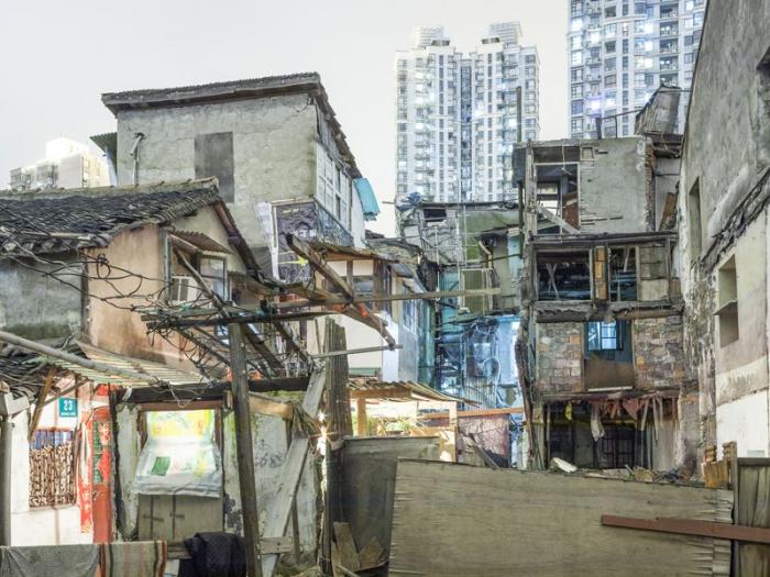 Трущобы упрямых китайцев, отказывающихся переселяться в квартиры (23 фото)
