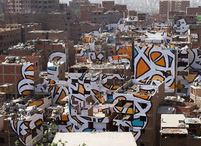 На стенах 50 домов Каира появился гигантский граффити-пазл (6 фото)
