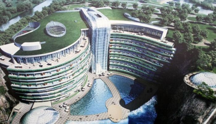 В заброшенном китайском карьере строят 19-этажный отель (8 фото)