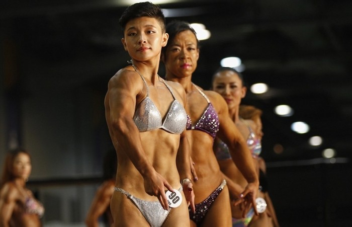 Соревнованиях по бодибилдингу среди женщин в Гонконге (9 фото)