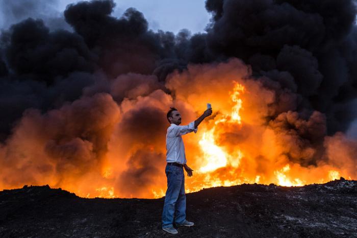 Мосул: жизнь в нефтяном дыму (24 фото)