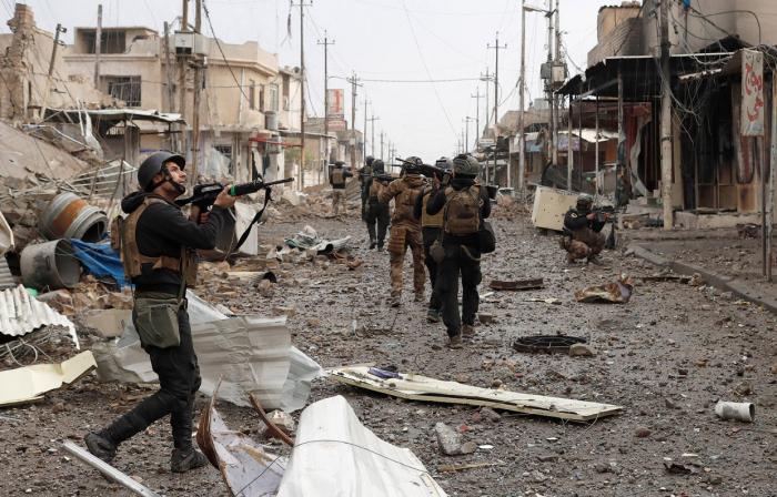 Ужасающие кадры войны в иракском городе (22 фото)