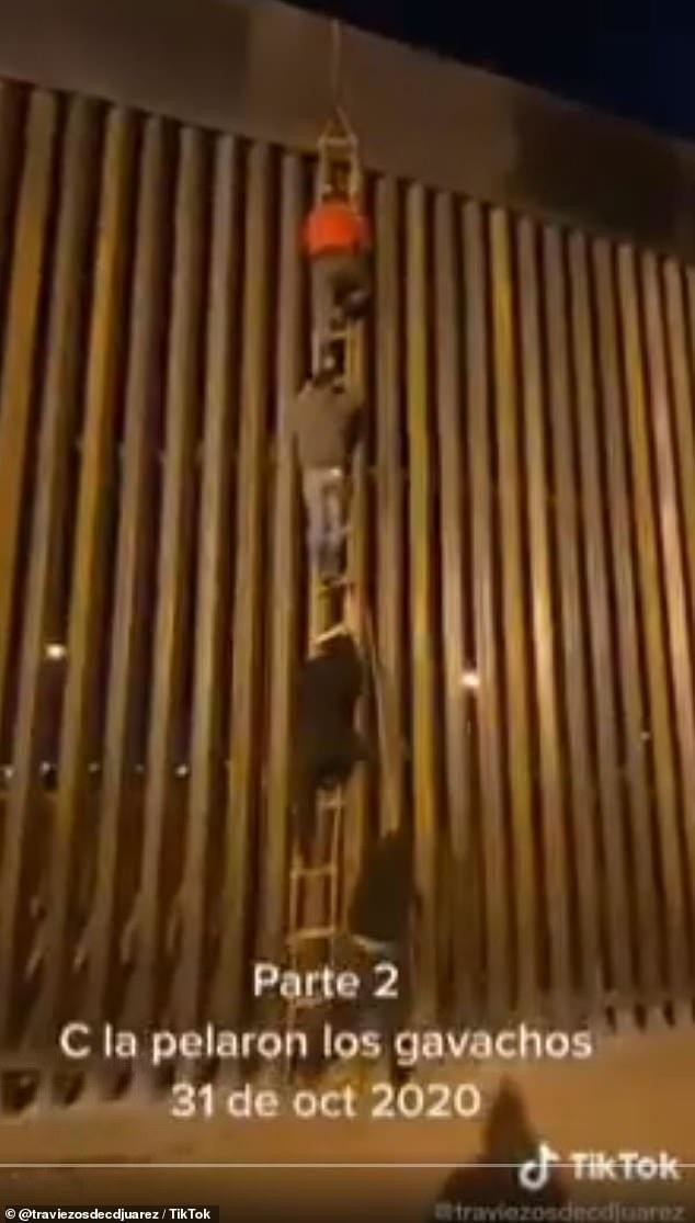 Нелегальные мигранты перелезают через трамповскую стену (3 фото)