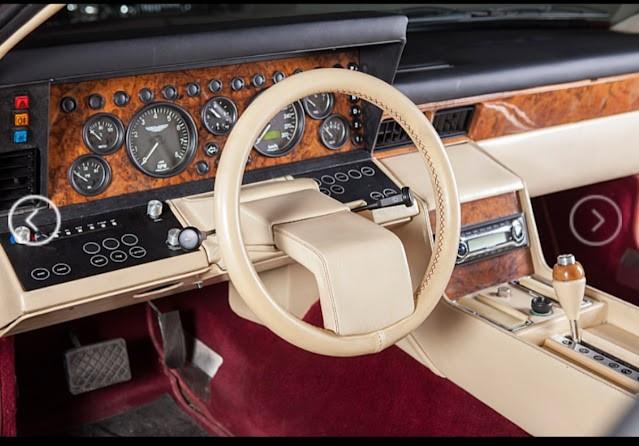   Aston Martin Lagonda,        (12 )